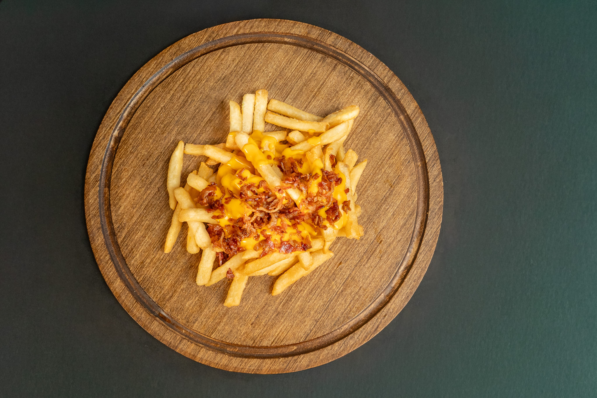 Papas con queso y tocino